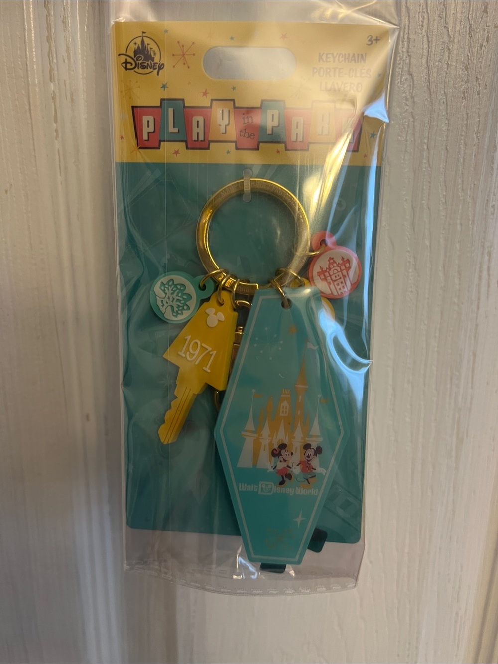 Disney Teal, Yellow & Pink Play the Park Kids Keychain with Castle Charm